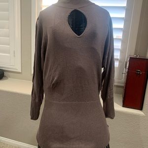 Bebe keyhole knit sweater with arm slit size large